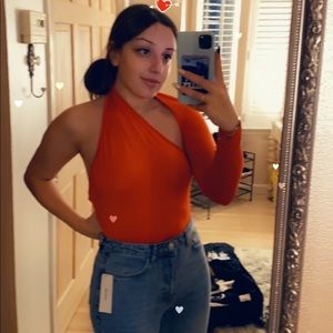 Red one shoulder body suit